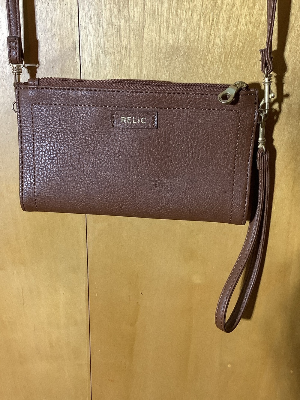 Relic light brown crossbody/wristlet